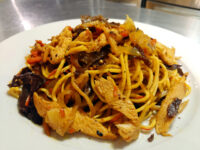 Lo Mein with Chicken Plate of Lo Mein with Chicken, noodles tossed with chicken, wood ear mushroom, carrot and onion