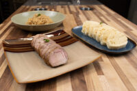 Sliced roast pork, stewed sauerkraut, and sliced knedlíky for Pork-Sauerkraut-Dumpling (Vepřo-knedlo-zelo)