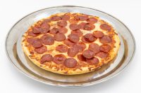60 min. Pan Pizza Round 60 min. Pan Pizza with pepperoni and melted cheese on a metal tray, angled view.